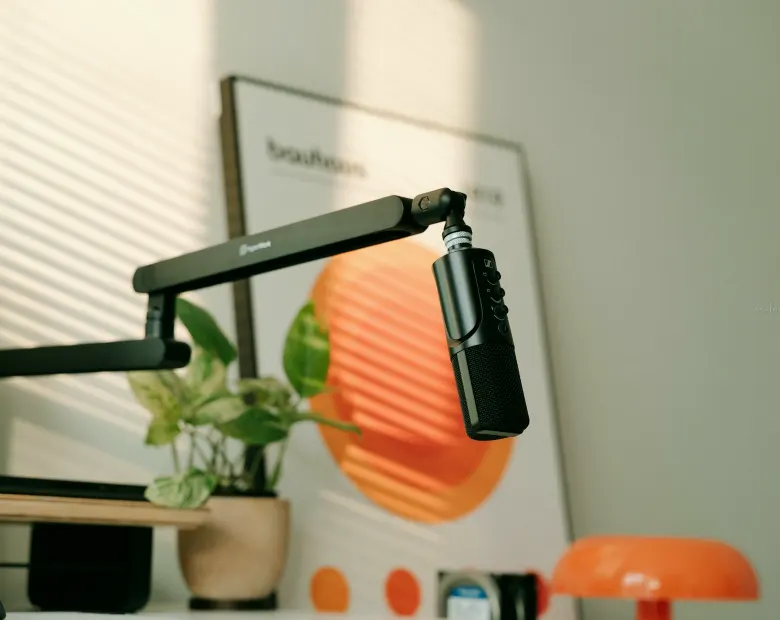 Camera on pedestal at a news desk